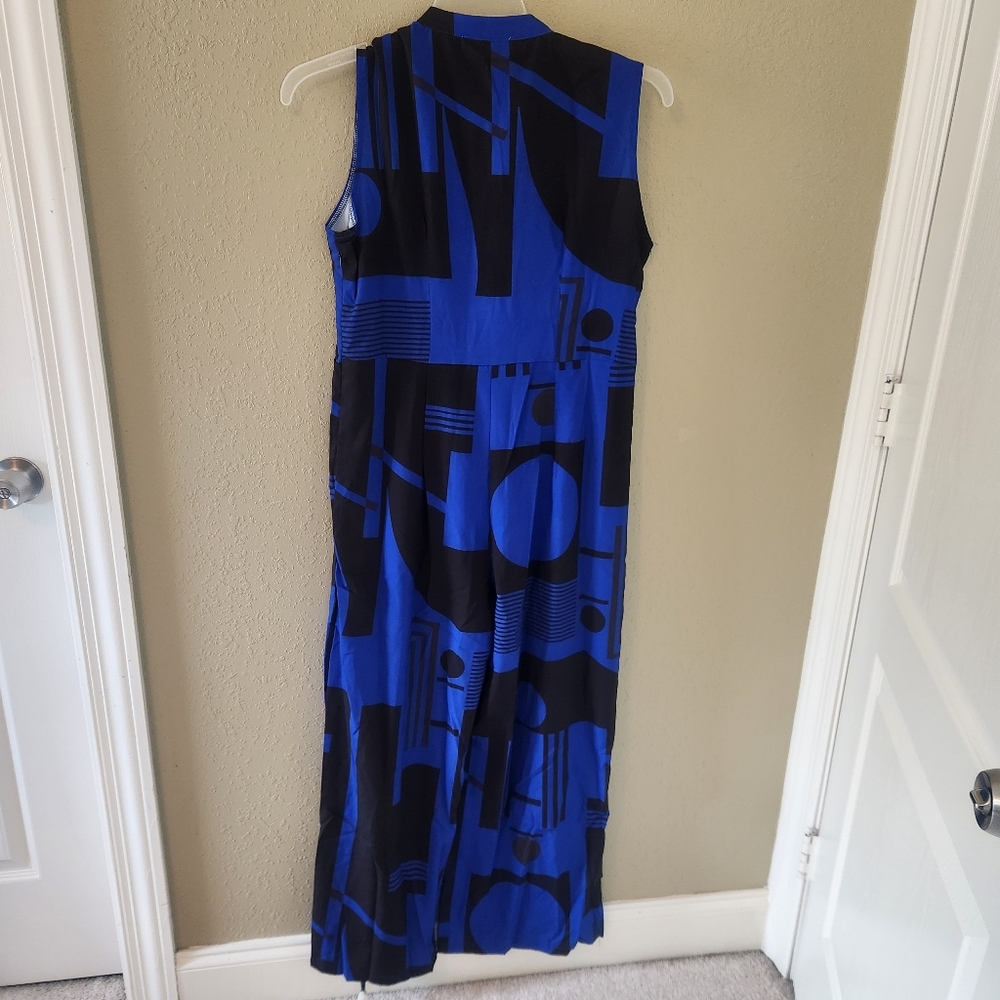 Nice Fashion blue and black jumpsuit. Patterns have circles and stripes. - Picture 9 of 10